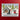 Purple Onion Designs Decorated Dog House Unmounted red rubber stamp created by Holly Mabutas featuring a dog dog house trimmed with Christmas lights
