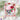 Purple Onion Designs Poinsettia Love part of the Chilliezgraphy by Pei range featuring a skunk wearing a scarf and gifting a large poinsettia flower