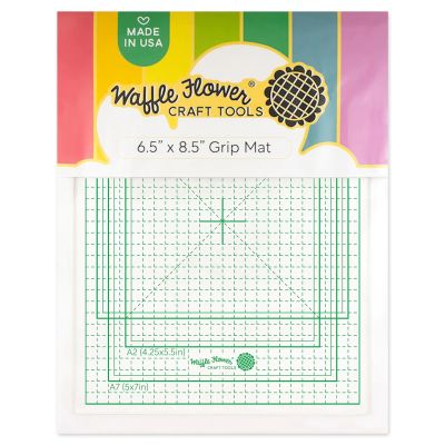 Grip Mat tool for holding stencils and die cuts for ease of colouring